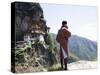 Bhutanese Man with Cell Phone, Taktshang Goemba (Tiger's Nest) Monastery, Paro, Bhutan-Angelo Cavalli-Stretched Canvas