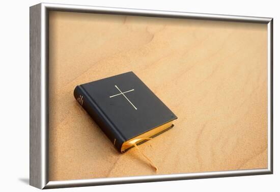 Bible on sand, Dubai, United Arab Emirates-Godong-Framed Photographic Print