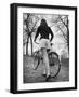 Bicycle Being Pushed by a Typical American Girl-Nina Leen-Framed Photographic Print