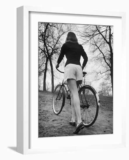Bicycle Being Pushed by a Typical American Girl-Nina Leen-Framed Photographic Print