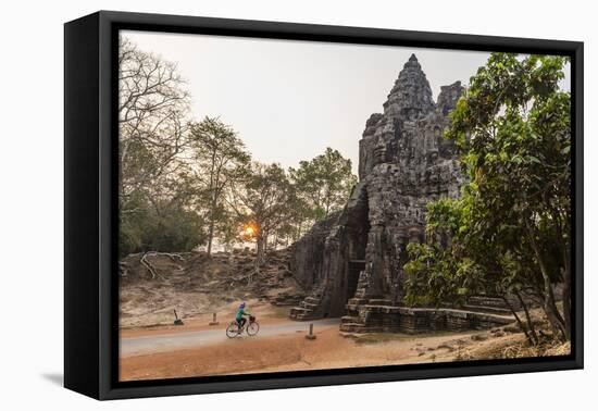 Bicycle Going Through the South Gate in Angkor Thom at Sunrise, Angkor, Siem Reap, Cambodia-Michael Nolan-Framed Stretched Canvas