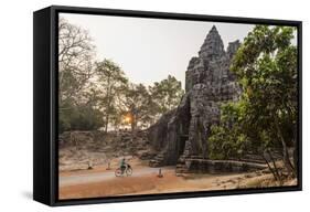 Bicycle Going Through the South Gate in Angkor Thom at Sunrise, Angkor, Siem Reap, Cambodia-Michael Nolan-Framed Stretched Canvas