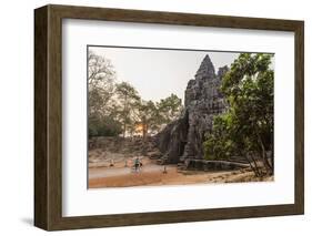 Bicycle Going Through the South Gate in Angkor Thom at Sunrise, Angkor, Siem Reap, Cambodia-Michael Nolan-Framed Photographic Print