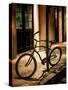 Bicycle Leaning Against Post in USA-Jody Miller-Stretched Canvas