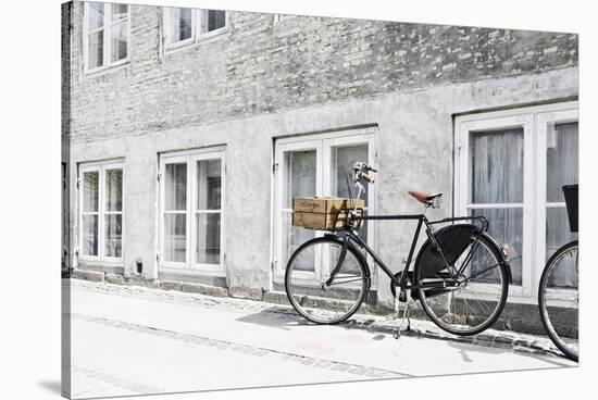 Bicycle Leaning Against Wall, City, Copenhagen, Denmark, Scandinavia-Axel Schmies-Stretched Canvas