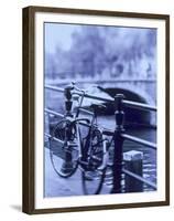 Bicycle on Rail by Canal, Amsterdam, Netherlands-Walter Bibikow-Framed Premium Photographic Print