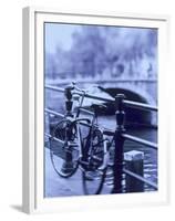 Bicycle on Rail by Canal, Amsterdam, Netherlands-Walter Bibikow-Framed Premium Photographic Print