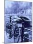 Bicycle on Rail by Canal, Amsterdam, Netherlands-Walter Bibikow-Mounted Premium Photographic Print