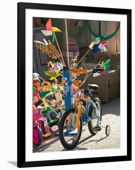 Bicycle Outside Toy Shop, Lesvos, Mytilini, Aegean Islands, Greece-Walter Bibikow-Framed Photographic Print