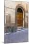 Bicycle parked outside front door, Lucca, Tuscany, Italy, Europe-John Guidi-Mounted Photographic Print