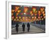 Bicycle Riders at Entranceway to Festival, Ice and Snow Festival, Harbin, Heilongjiang, China-Walter Bibikow-Framed Photographic Print