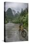 Bicycle sits in front of the Guilin Mountains, Guilin, Yangshuo, China-Josh Anon-Stretched Canvas