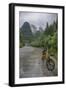 Bicycle sits in front of the Guilin Mountains, Guilin, Yangshuo, China-Josh Anon-Framed Photographic Print