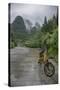 Bicycle sits in front of the Guilin Mountains, Guilin, Yangshuo, China-Josh Anon-Stretched Canvas