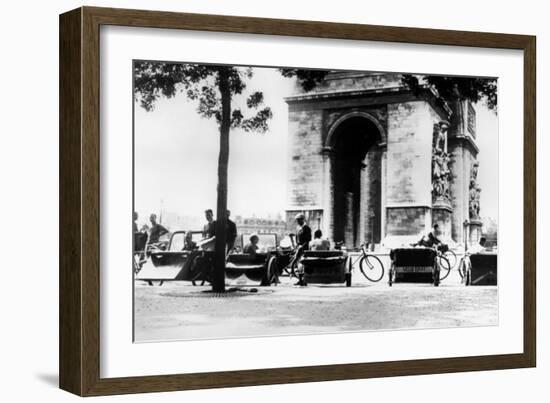 Bicycle Taxis in the Place D'Etoile by the Arc De Triomphe, German-Occupied Paris, August 1943-null-Framed Giclee Print