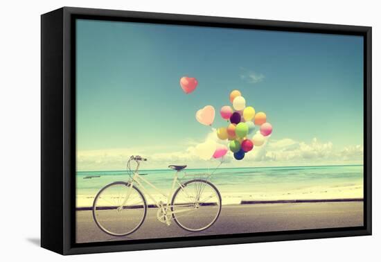 Bicycle Vintage with Heart Balloon on Beach Blue Sky Concept of Love in Summer and Wedding-jakkapan-Framed Stretched Canvas