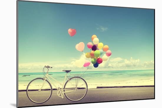 Bicycle Vintage with Heart Balloon on Beach Blue Sky Concept of Love in Summer and Wedding-jakkapan-Mounted Photographic Print