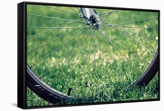 Bicycle Wheel in Grass-null-Framed Stretched Canvas