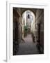 Bicycles and motorcycles parked in an alley off the Rue de la Scala, Essaouira, Morocco-null-Framed Photographic Print