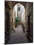 Bicycles and motorcycles parked in an alley off the Rue de la Scala, Essaouira, Morocco-null-Mounted Photographic Print