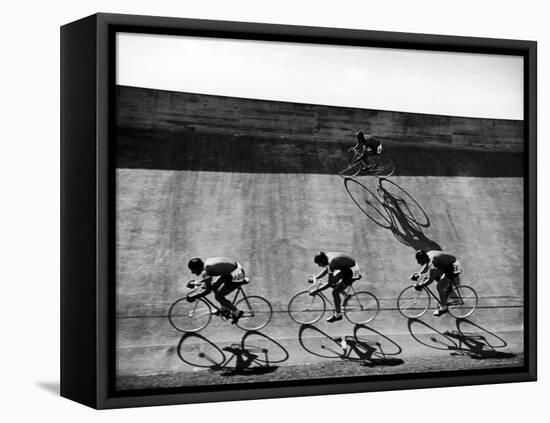 Bicycles Forming Distorted Designs on Track as Peddlers Grind Away in the 4,000 Meter Team Pursuit-Ralph Crane-Framed Stretched Canvas