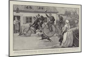 Bicycles in the German Army, Soldiers Returning Home on Furlough Riding Through a Village-Henry Marriott Paget-Mounted Giclee Print