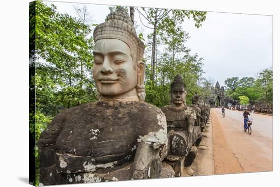 Bicycles Near the South Gate at Angkor Thom-Michael Nolan-Stretched Canvas