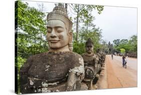 Bicycles Near the South Gate at Angkor Thom-Michael Nolan-Stretched Canvas