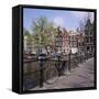 Bicycles on a Bridge Across the Canal at Herengracht in Amsterdam, Holland-Roy Rainford-Framed Stretched Canvas