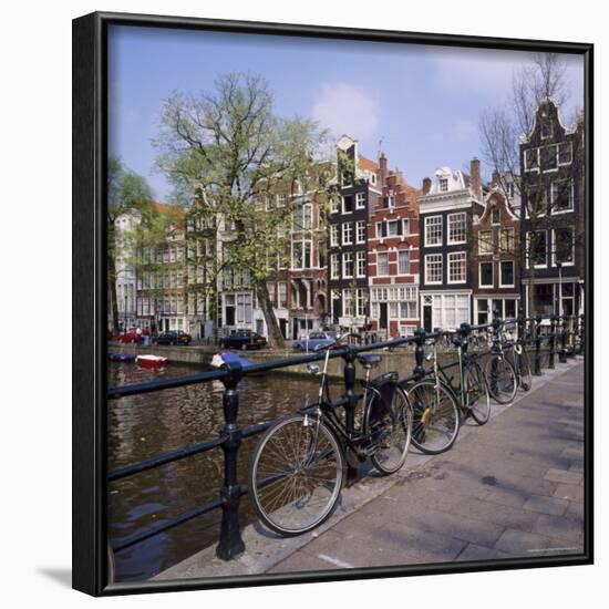 Bicycles on a Bridge Across the Canal at Herengracht in Amsterdam, Holland-Roy Rainford-Framed Photographic Print