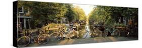 Bicycles on Bridge Over Canal, Amsterdam, Netherlands-null-Stretched Canvas