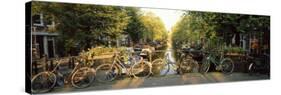 Bicycles on Bridge Over Canal, Amsterdam, Netherlands-null-Stretched Canvas