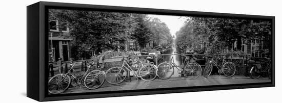 Bicycles on Bridge over Canal, Amsterdam, Netherlands-null-Framed Stretched Canvas