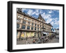 Bicycles parked in front of the Magasin du Nord department store, Copenhagen, Denmark, Scandinavia-Jean Brooks-Framed Photographic Print