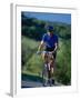 Bicyclist on Road, Napa Valley, CA-Robert Houser-Framed Premium Photographic Print