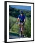 Bicyclist on Road, Napa Valley, CA-Robert Houser-Framed Premium Photographic Print