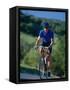 Bicyclist on Road, Napa Valley, CA-Robert Houser-Framed Stretched Canvas