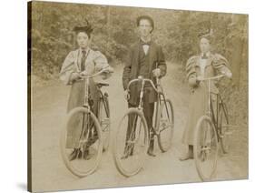 Bicyclists Posing on Path-null-Stretched Canvas