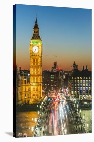 Big Ben (the Elizabeth Tower) and busy traffic on Westminster Bridge at dusk, London, England, Unit-Fraser Hall-Stretched Canvas
