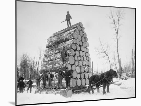 Big Load of Logs on a Horse Drawn Sled in Michigan, Ca. 1899-null-Mounted Photo