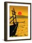 Big red setting sun beyond fishing boat moored off beach south of the city, Otres Beach, Cambodia-Robert Francis-Framed Photographic Print