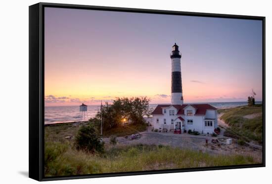Big Sable Point Lighthouse At Sunset-Adam Romanowicz-Framed Stretched Canvas