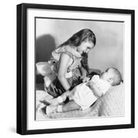 Big Sister Looks Down on Her Baby Brother, Ca. 1948-null-Framed Photographic Print