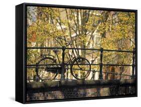 Bike on Bridge, Amsterdam, Holland-Alan Copson-Framed Stretched Canvas