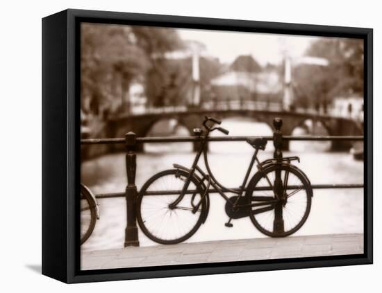 Bike on Bridge and Canal, Amsterdam, Holland-Jon Arnold-Framed Stretched Canvas