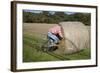 Bike Riding into Hay Bail-null-Framed Photographic Print