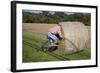 Bike Riding into Hay Bail-null-Framed Photographic Print