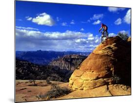 Biker Challenges Slickrock near Rockville, Utah, USA-Howie Garber-Mounted Photographic Print