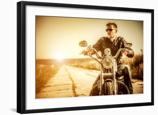 Biker Man Sits on a Bike-Andrey Armyagov-Framed Photographic Print