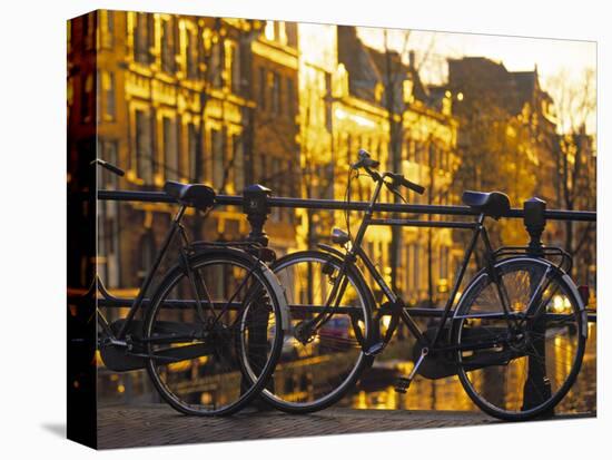 Bikes, Amsterdam, Holland-Peter Adams-Stretched Canvas